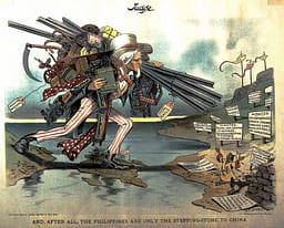 "AND, AFTER ALL, THE PHILIPPINES ARE ONLY THE STEPPING-STONE TO CHINA". Editorical cartoon from after USA conquest of the Philippines. Uncle Sam is seen stepping across the ocean into the Philippines loaded down with symbols of modern civilization, including books labeled "Education" and "Religion", bridges, railroad trains, sewing machine, farm machinery. A short distance beyond the Philippines a small figure representing China stands with a happy expression and open arms, surrounded by signs saying large quantities of modern goods are wanted.